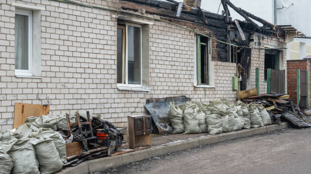 Professional Fire Damage Restoration technician working in Clayton, NJ